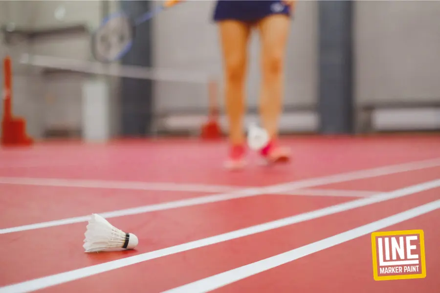 A woman on a badminton court